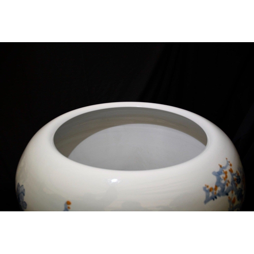 237 - This is a very substantial piece of hand made Chinese porcelain, measuring approximately three and a... 