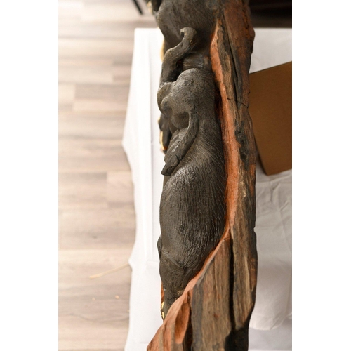 240 - A large wood carving with the whole piece hand carved from an old tree root. Note. This skilful carv... 