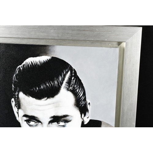 241 - An original oil on canvas of CLARK GABLE in bespoke frame. The painting is signed T V by the English... 