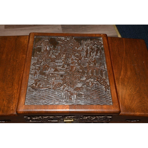 26 - A rare old Chinese chest depicting a hand carved village scene. Origin Ningbo, Zhejiang Province Cir... 