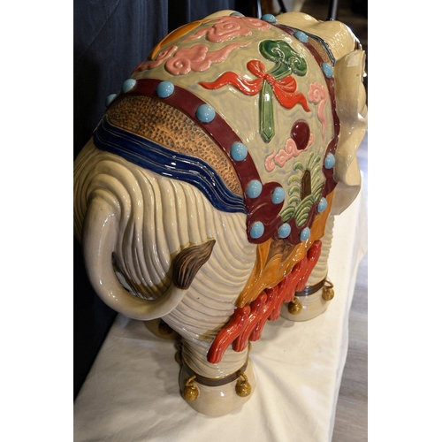 30 - An original Shiwan porcelain elephant which has been hand painted and decorated in fine detail. Orig... 