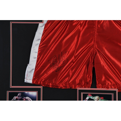 39 - A very nicely framed pair of boxing shorts which FRANK BRUNO  has personally signed. NOTE: This item... 