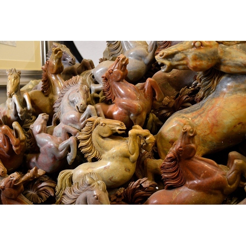 41 - A unique very large finely detailed Chinese hand carved soapstone carving of 40 galloping horses. Co... 