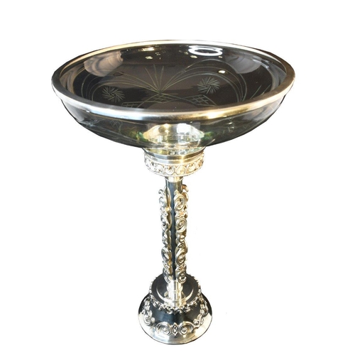 51 - A tall cut glass bowl with ornately detailed silvered metal base.. H: 53cm  W: 41cm  D: 41cm#51