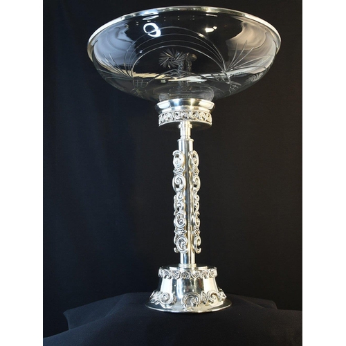 51 - A tall cut glass bowl with ornately detailed silvered metal base.. H: 53cm  W: 41cm  D: 41cm#51