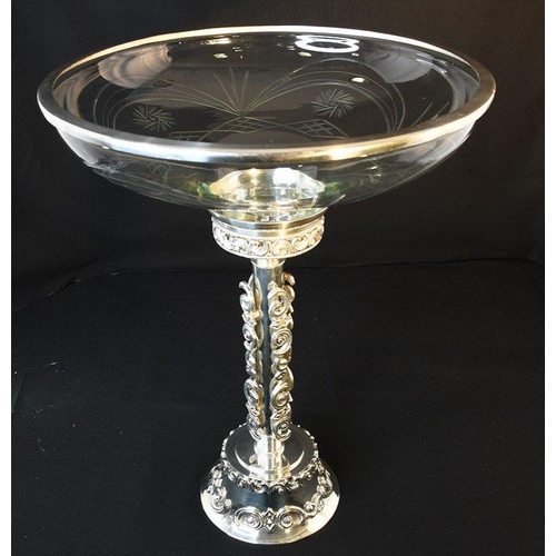 51 - A tall cut glass bowl with ornately detailed silvered metal base.. H: 53cm  W: 41cm  D: 41cm#51