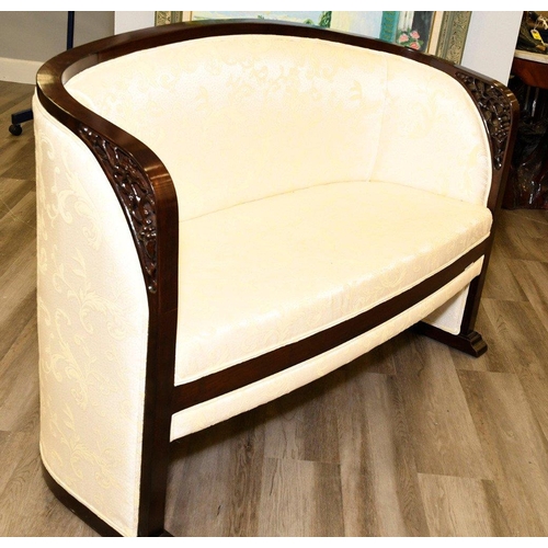 54 - The frame is made from solid rosewood with open hand carving on the arms. The base of the sofa is cr... 