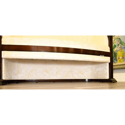 54 - The frame is made from solid rosewood with open hand carving on the arms. The base of the sofa is cr... 