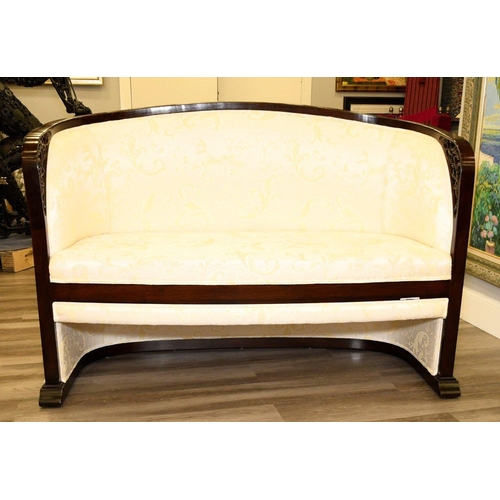 54 - The frame is made from solid rosewood with open hand carving on the arms. The base of the sofa is cr... 