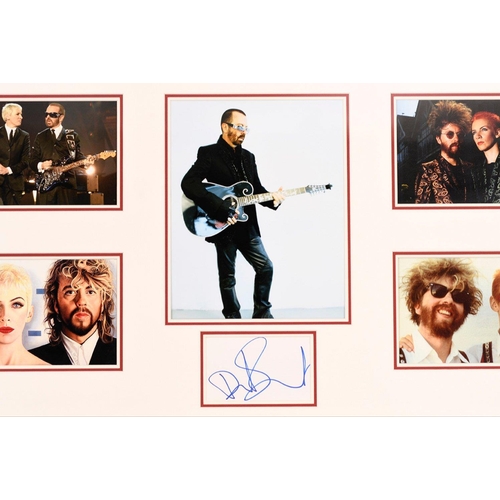 60 - A framed presentation of the iconic duo The EURYTHMICS which bears the original signature of DAVE ST... 