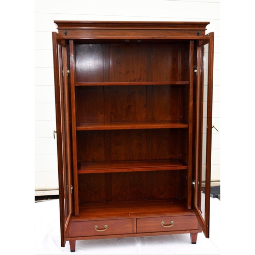 65 - A rosewood document cabinet/bookcase. This has two glass doors that slide back into the cabinet with... 