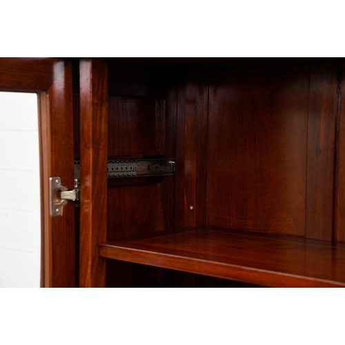 65 - A rosewood document cabinet/bookcase. This has two glass doors that slide back into the cabinet with... 