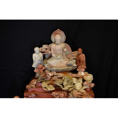 67 - A very large and heavy Chinese soapstone carving depicting multiple Buddha carvings throughout. Orig... 