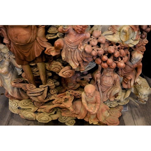 67 - A very large and heavy Chinese soapstone carving depicting multiple Buddha carvings throughout. Orig... 