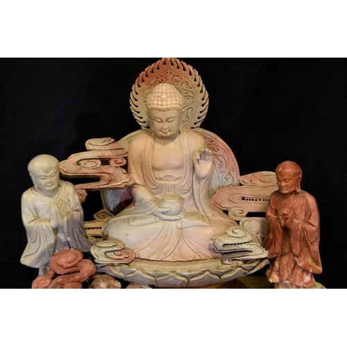 67 - A very large and heavy Chinese soapstone carving depicting multiple Buddha carvings throughout. Orig... 