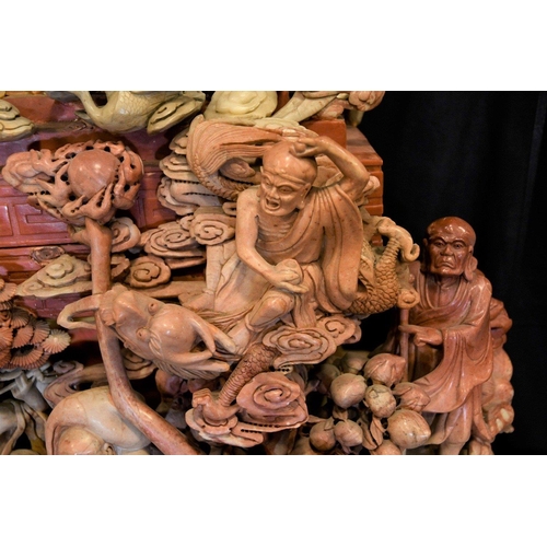 67 - A very large and heavy Chinese soapstone carving depicting multiple Buddha carvings throughout. Orig... 