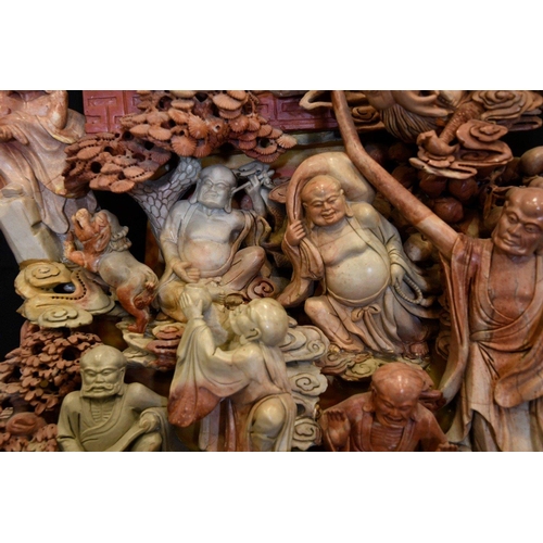 67 - A very large and heavy Chinese soapstone carving depicting multiple Buddha carvings throughout. Orig... 