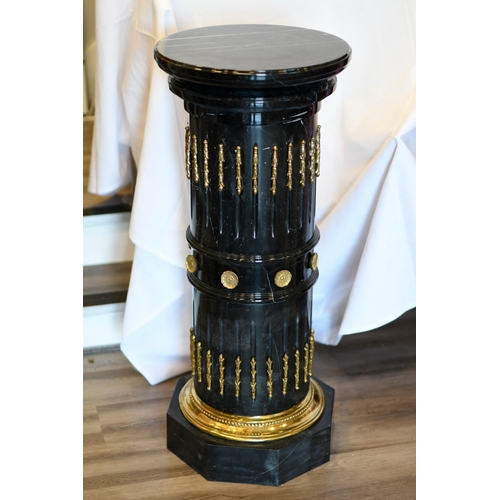 68 - A solid black marble plinth with brass detail fittings. Very highly polished and in excellent condit... 