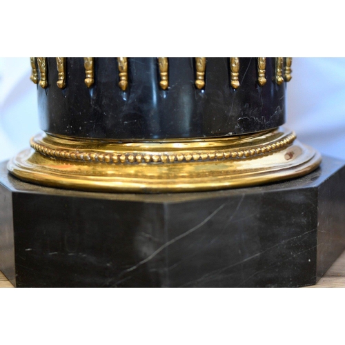 68 - A solid black marble plinth with brass detail fittings. Very highly polished and in excellent condit... 