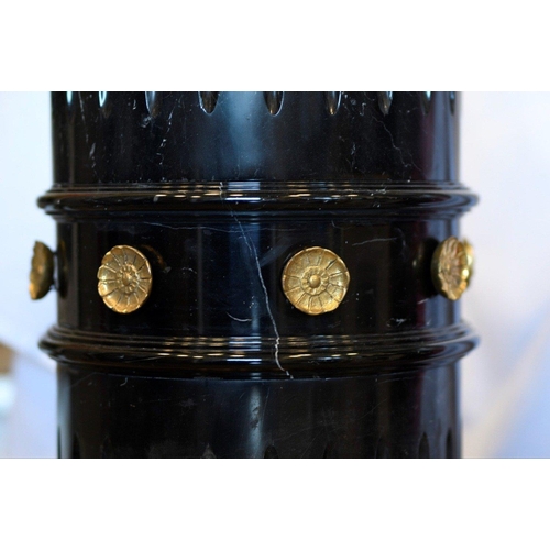 68 - A solid black marble plinth with brass detail fittings. Very highly polished and in excellent condit... 