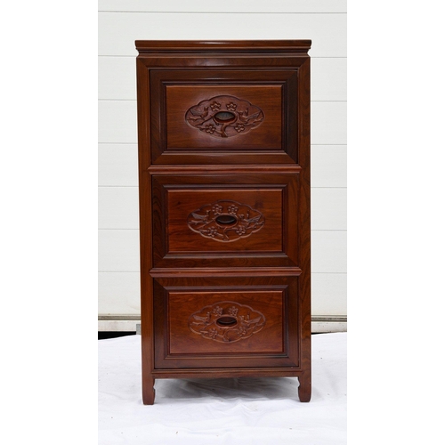 72 - A solid rosewood filing cabinet which houses three lockable drawers and displays a bird and flower m... 