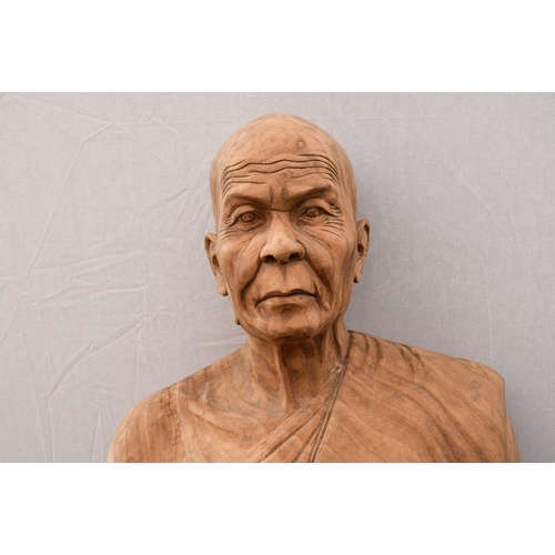 8 - A rare life size highly detailed carving made from solid teak depicting a standing monk. Origin Nort... 