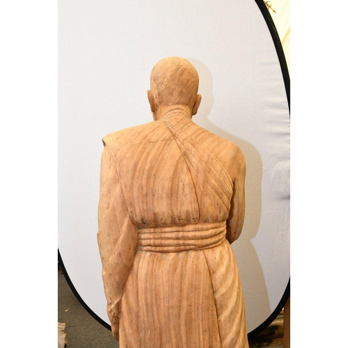 8 - A rare life size highly detailed carving made from solid teak depicting a standing monk. Origin Nort... 