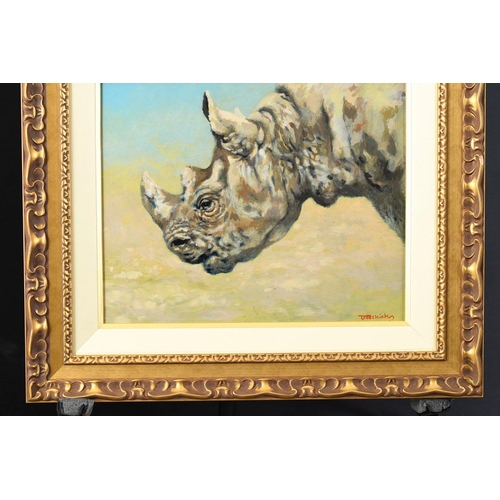 80 - An original oil on panel of a rare white rhino by the late English artist JOEL KIRK. Very nicely fra... 