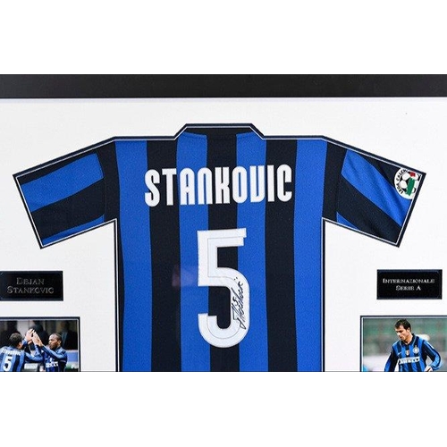 81 - A very rare signed framed shirt which has been personally signed by the famous Serbian footballer DE... 