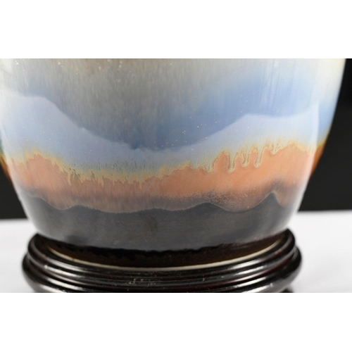 91 - A completely hand made porcelain Chinese art vase. This vase has some wonderful colour gradient in t... 