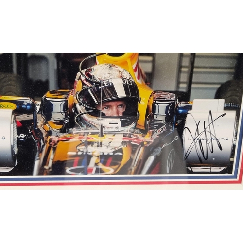 98 - A framed presentation incorporating a signed photograph of the famous F1 driver SEBASTIAN VETTEL. Su... 