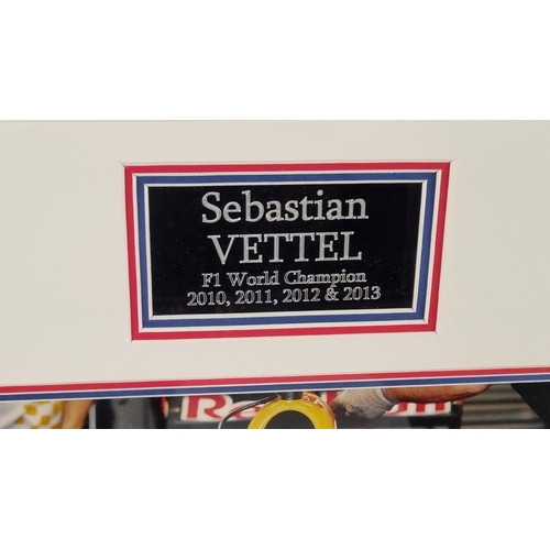 98 - A framed presentation incorporating a signed photograph of the famous F1 driver SEBASTIAN VETTEL. Su... 