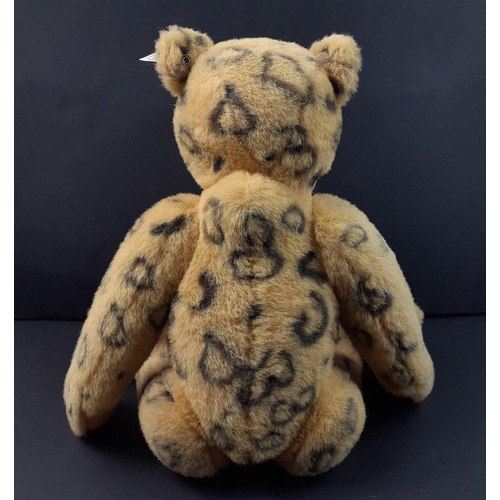 188 - A STEIFF Alpaca leopard growler bear, reference 420696, stands 40cm tall with alpaca fur from a limi... 