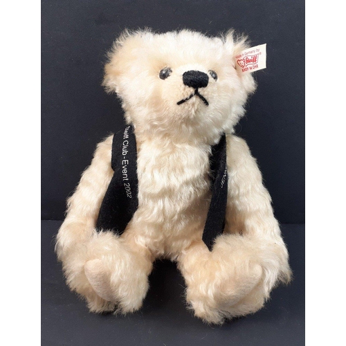 190 - A STEIFF white event bear 2002 with JENNERS waistcoat, reference number 420337, stands 21cm tall, co... 