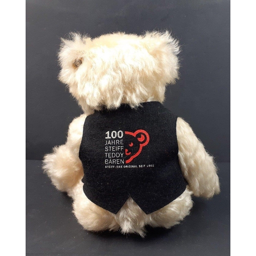 190 - A STEIFF white event bear 2002 with JENNERS waistcoat, reference number 420337, stands 21cm tall, co... 