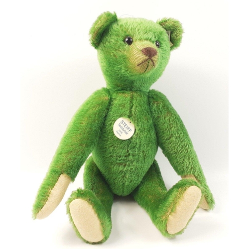 198 - A STEIFF green 1908 Ours Teddy, reference 408540, stands 35cm tall, with certificate number 01071 of... 