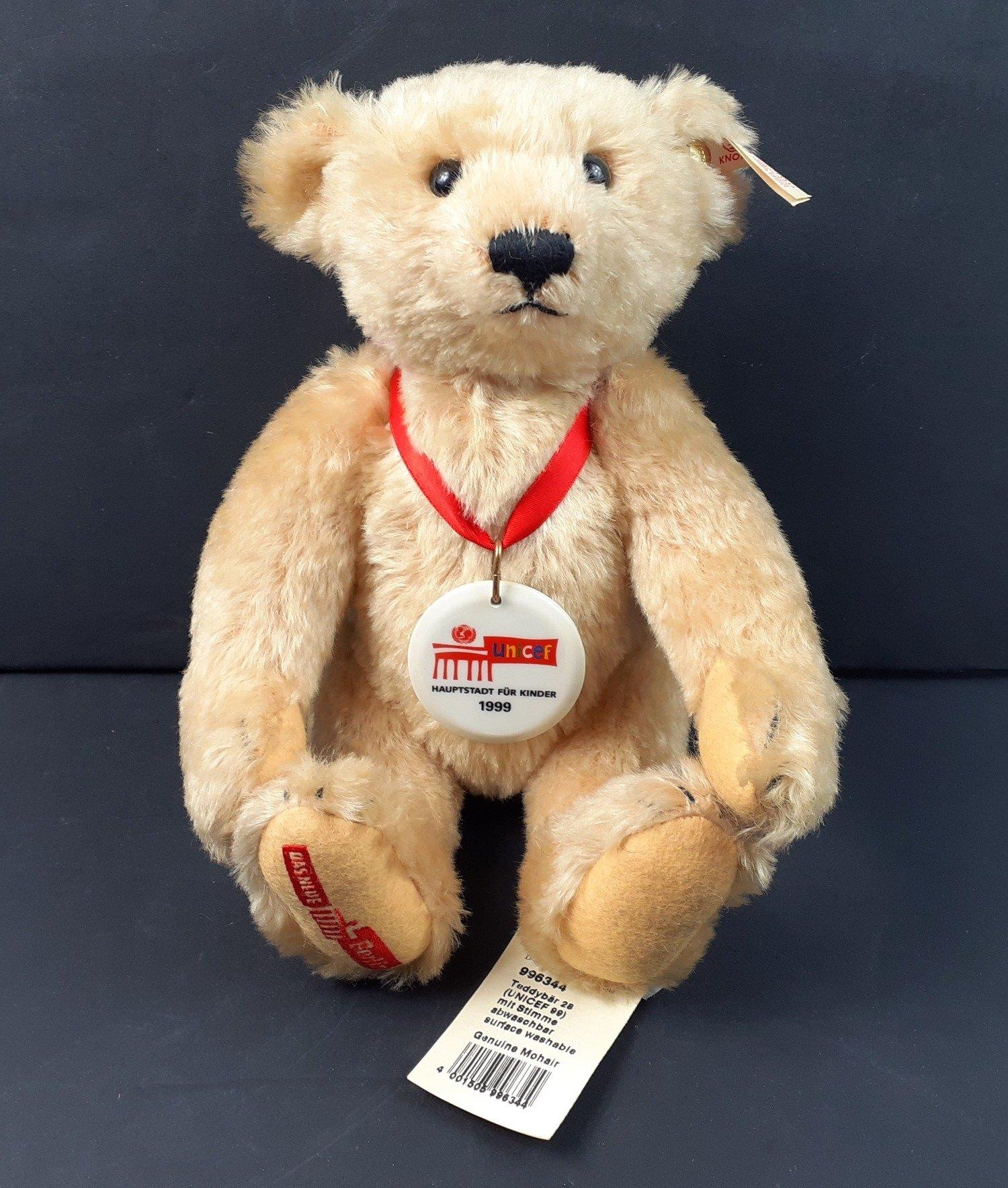 A STEIFF UNICEF 1999 teddy bear standing 28cm high, reference number  996344, with porcelain medallio