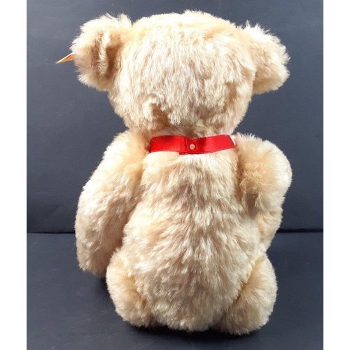 A STEIFF UNICEF 1999 teddy bear standing 28cm high, reference number  996344, with porcelain medallio