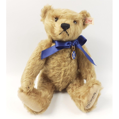 211 - A STEIFF Andrew bear, reference 661761, exclusive to JENNERS, signed SIMON, standing 27cm high, with... 