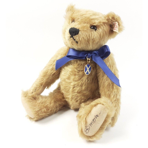 211 - A STEIFF Andrew bear, reference 661761, exclusive to JENNERS, signed SIMON, standing 27cm high, with... 