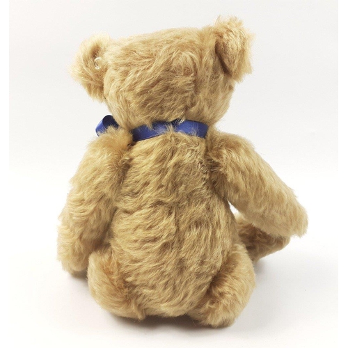 211 - A STEIFF Andrew bear, reference 661761, exclusive to JENNERS, signed SIMON, standing 27cm high, with... 