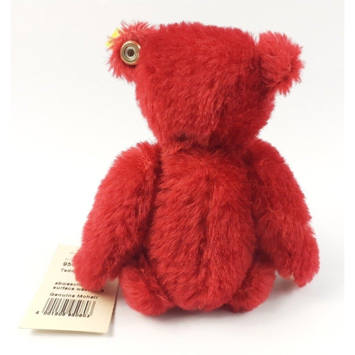 216 - A STEIFF original red teddy, reference 950803, stands 16cm high, with labels, no box#57