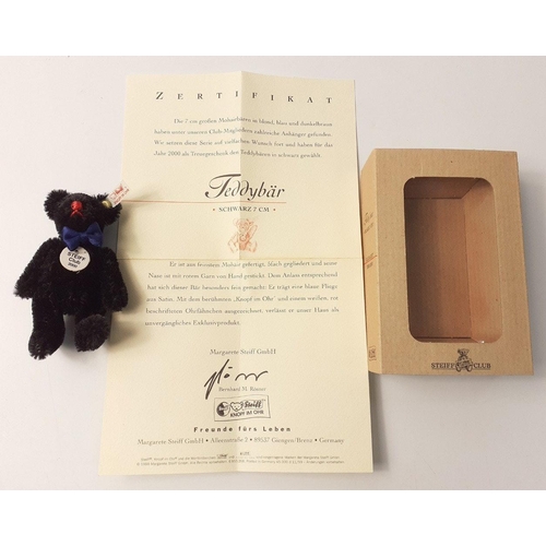 228 - A STEIFF CLUB 2000 black teddy bear in its box, stands 7cm high with certificate#66