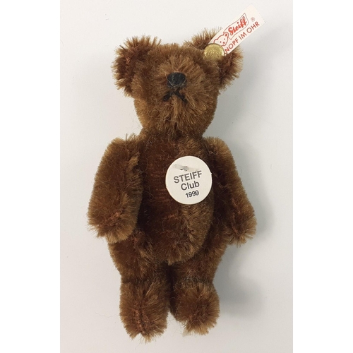 229 - A STEIFF CLUB 1999 brown teddy bear in its box, stands 7cm high with certificate#67