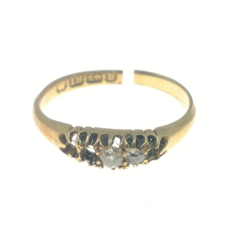 1 - An 18ct gold ring in ring box .  Missing stones and cut in band. Two remaining small diamonds.  Size... 