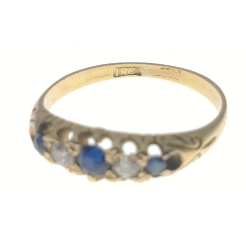 2 - An 18c stamped gold ring with two small diamonds and three sapphires. Size P Gross weight 2.45g appr... 