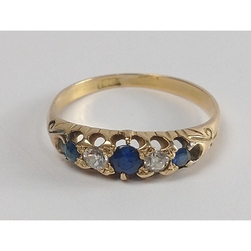 2 - An 18c stamped gold ring with two small diamonds and three sapphires. Size P Gross weight 2.45g appr... 