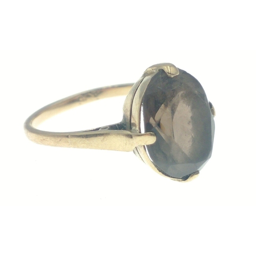 24 - A 9ct marked gold ring with smokey quartz centre stone. Size H total gross weight 2g approx.#25