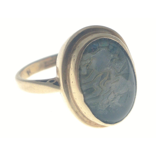 41 - A ring stamped 375 and 9ct, hallmarked for Birmingham 1973 set with an oval stone 15mm long, size N,... 