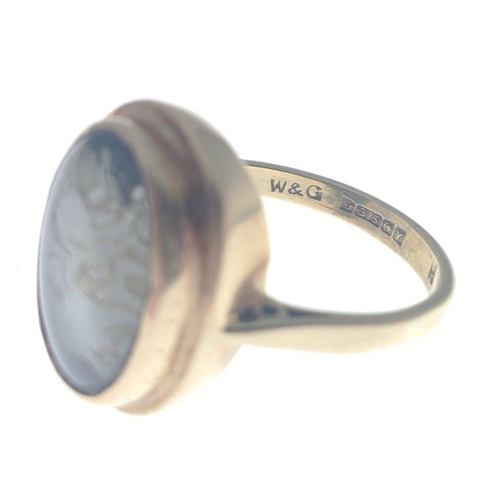 41 - A ring stamped 375 and 9ct, hallmarked for Birmingham 1973 set with an oval stone 15mm long, size N,... 